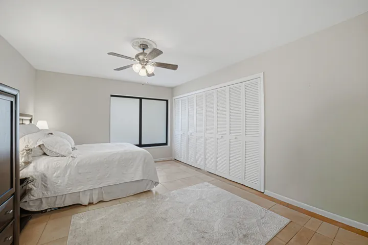 The closet in the guest bedroom is ten feet long and has four bifold doors.