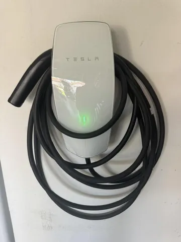 Equipped with an EV / Tesla charger.
