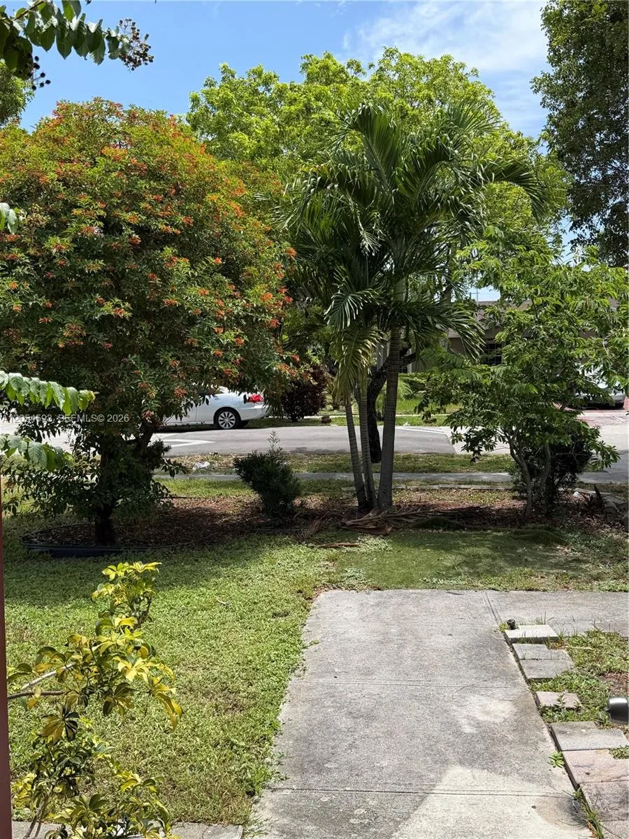 Facing yard from front door