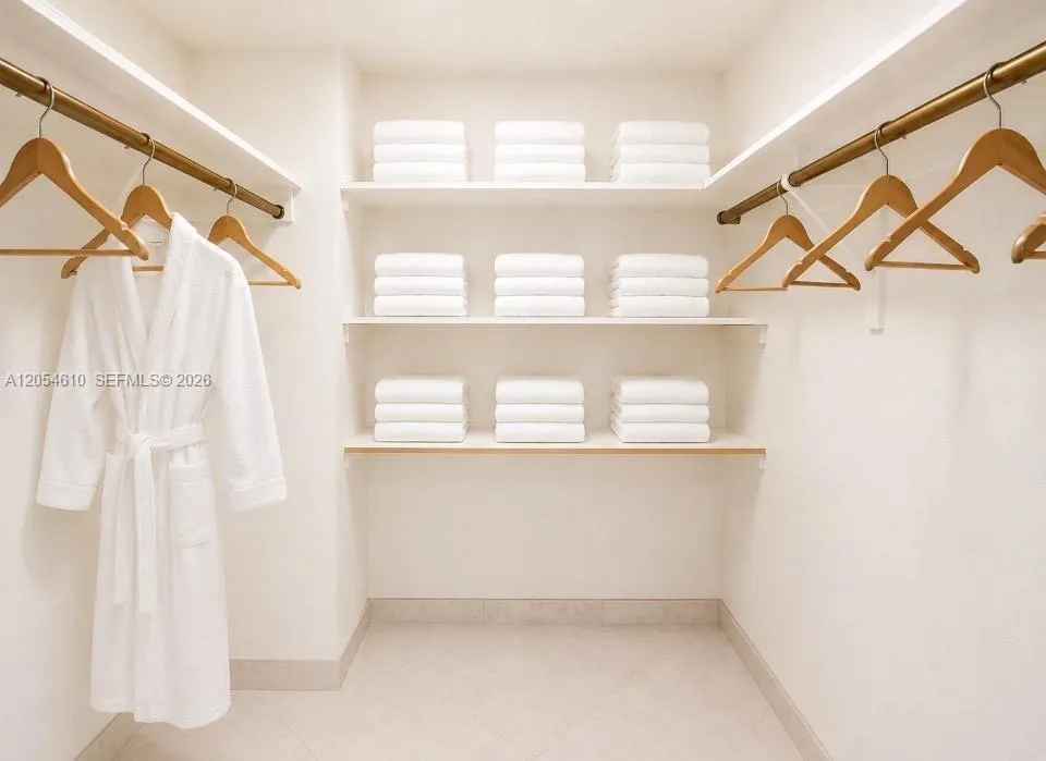 PRINCIPLE BEDROOM SUITE WALK-IN CLOSET (VIRTUALLY STAGED)