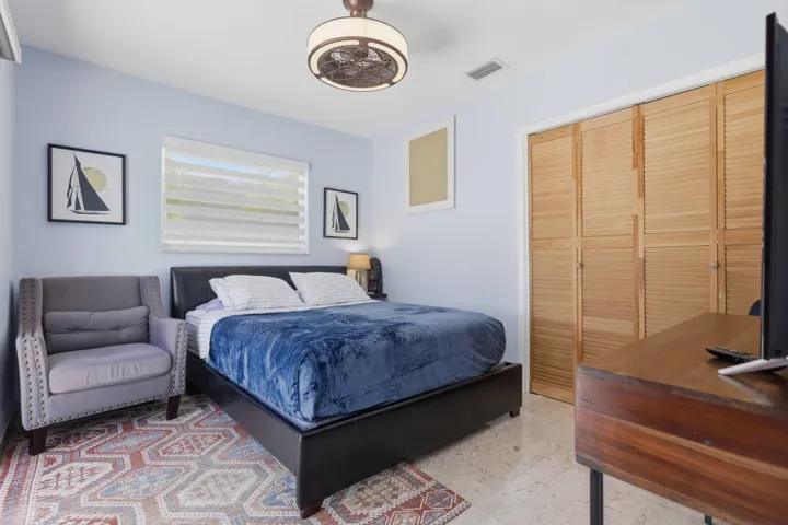 Guest Bedroom with Sliding Doors to pool