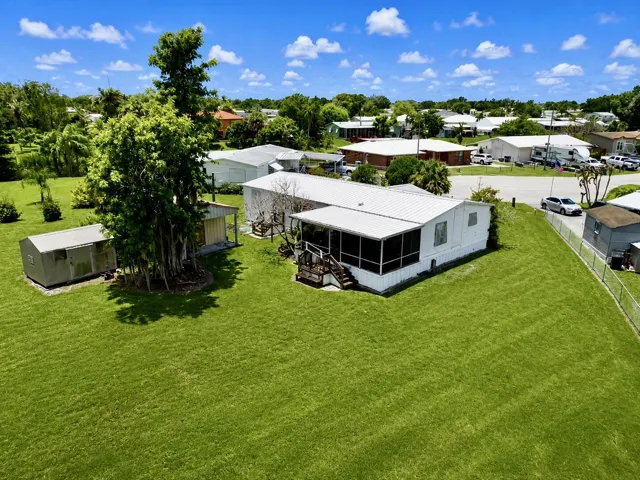 Aerial Looking at Back Of Home