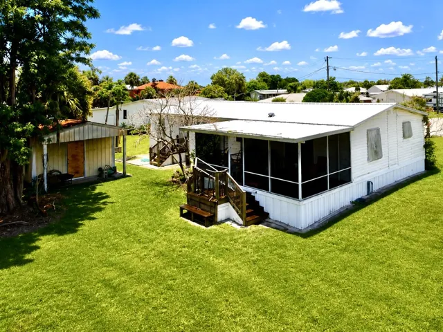 Aerial Looking at Back Of Home