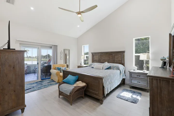 Master Bedroom w/ sliding doors to enclosed Patio