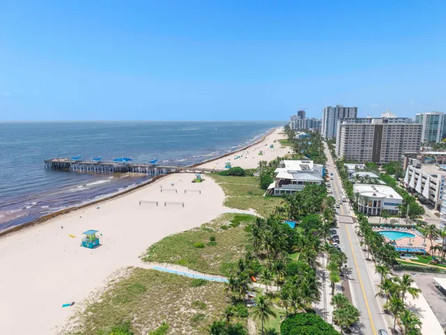 Can you see those white buildings on the left side of the road on the beach?Those are 4 of the newest restaurants on the sand, Oceanic, The Beach house and a huge Tiki cafe