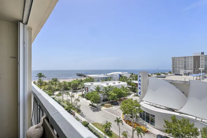 Hurricane impact Accordion shutters are fabulous to just close like drapes and turn the key when you leave the unit for vacation you do not have to bring in your furniture on this balcony with these shutters,