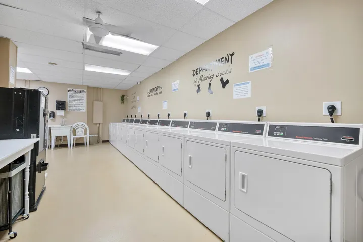 The laundry room is large and has enough machinery for everyone!