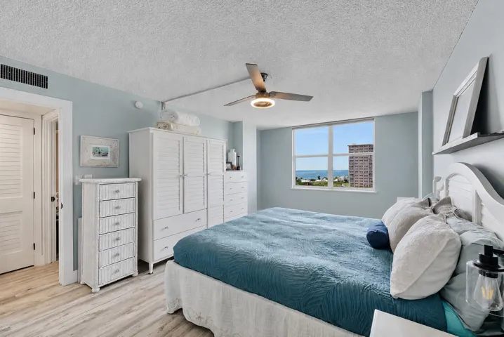 Large master bedroom with en-suite upgraded modern bathroom with soft close drawers and cabinet doors in real wood.
