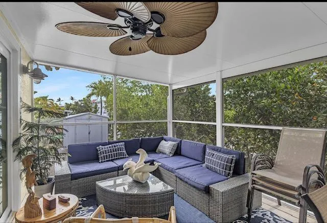 Oversized screened patio overlooks luscious native flora & fauna