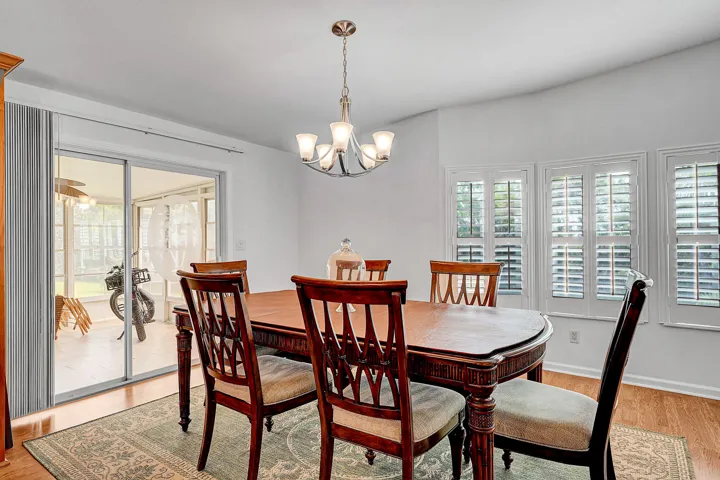 Formal Dining. Table and chairs convey to Buyer.