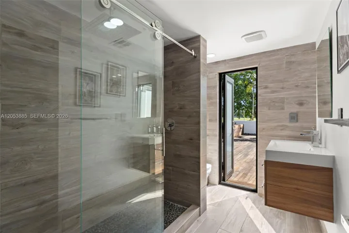 Cabana bath lower level by bar and media room