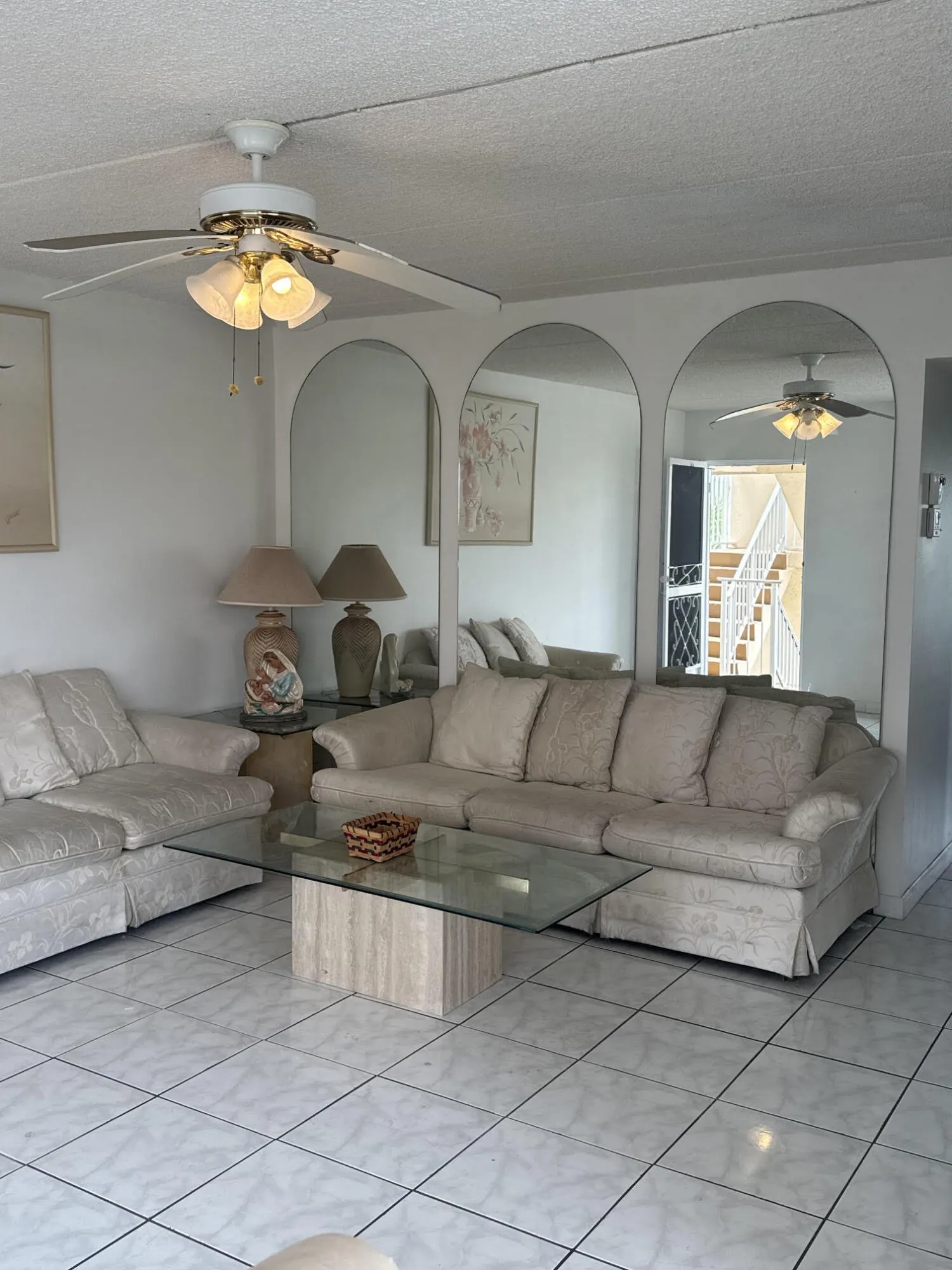 Large living room with accents mirrors