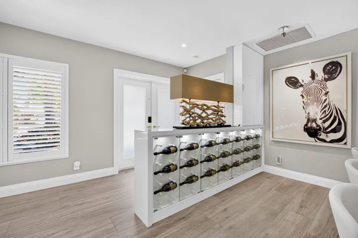 FOYER VIEW WITH WINE WALL