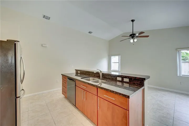 Everyone loves the Island. Sink overlooks family room
