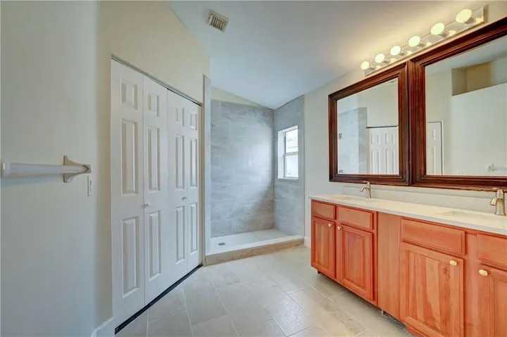 Bath with double vanity, big walk in closet, walk in shower