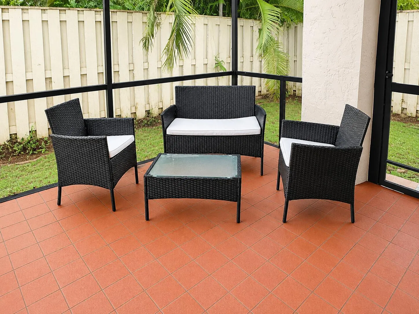 Screened patio featuring terracotta-toned tile flooring