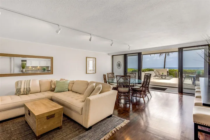 LIVING ROOM TO PRIVATE PATIO & OCEAN