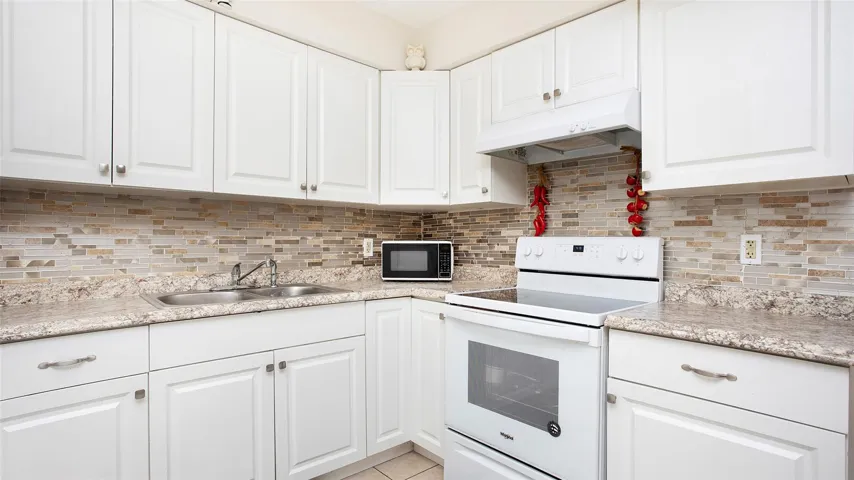 kitchen with newer appliances and counter tops