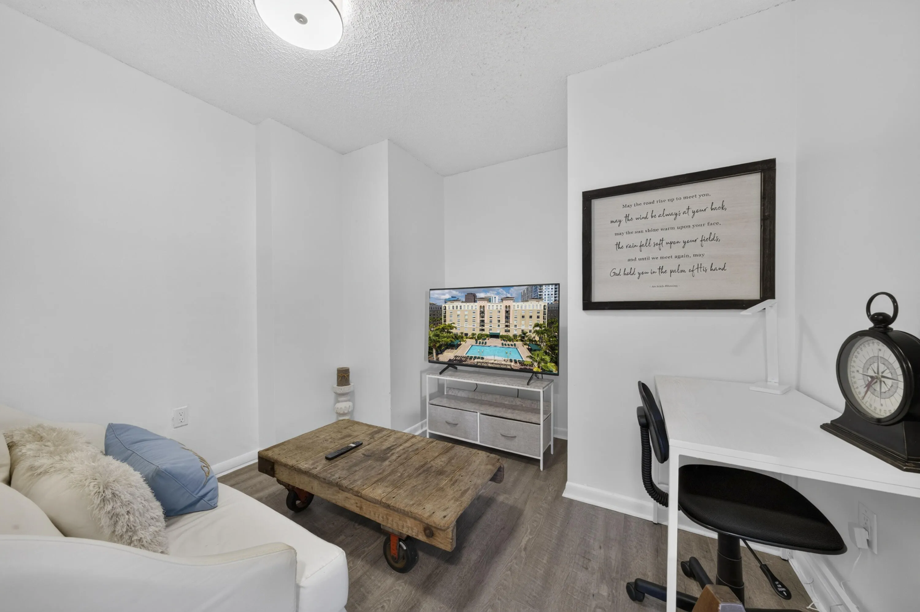Versatile flex room ideal for a home office, media room, or additional living space.
