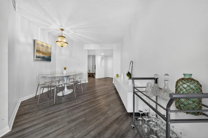 Dedicated dining area seamlessly connects to the open-concept living spaces, perfect for everyday meals or entertaining.