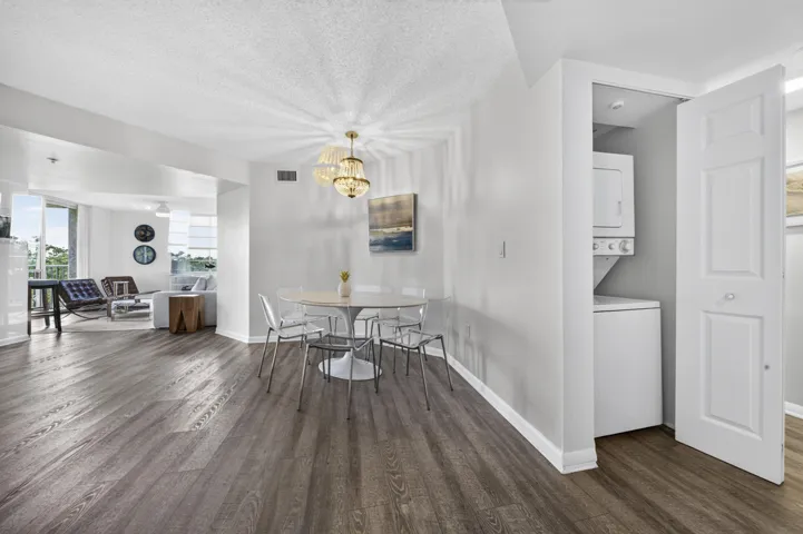 Dedicated dining area seamlessly connects to the open-concept living spaces, perfect for everyday meals or entertaining.