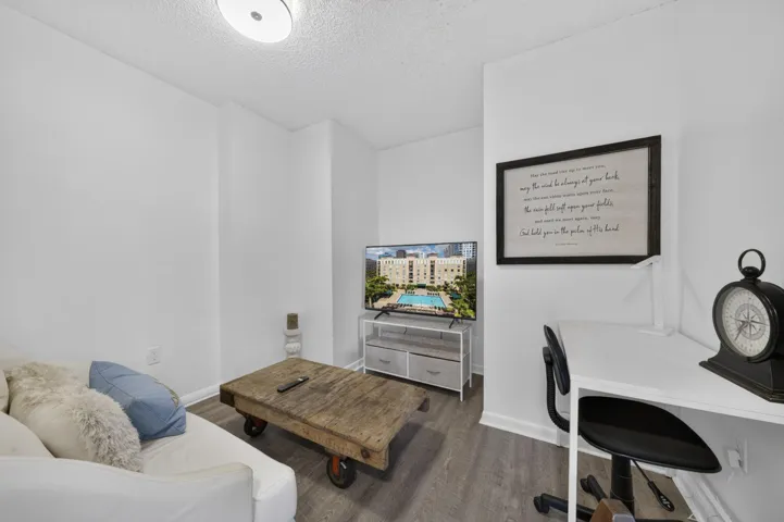 Versatile flex room ideal for a home office, media room, or additional living space.