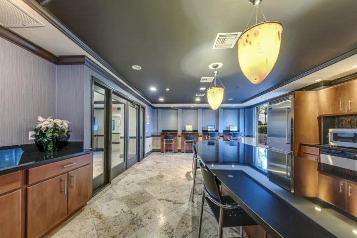 Resident clubroom with an entertaining kitchen—perfect for hosting friends and special occasions.