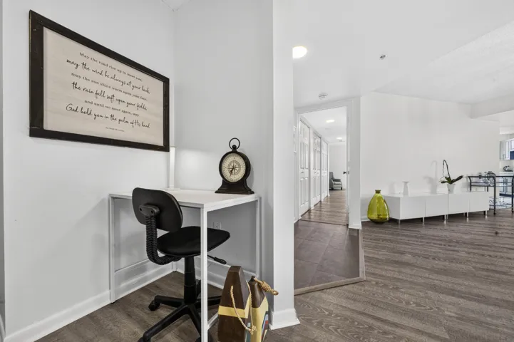 Versatile flex room ideal for a home office, media room, or additional living space.