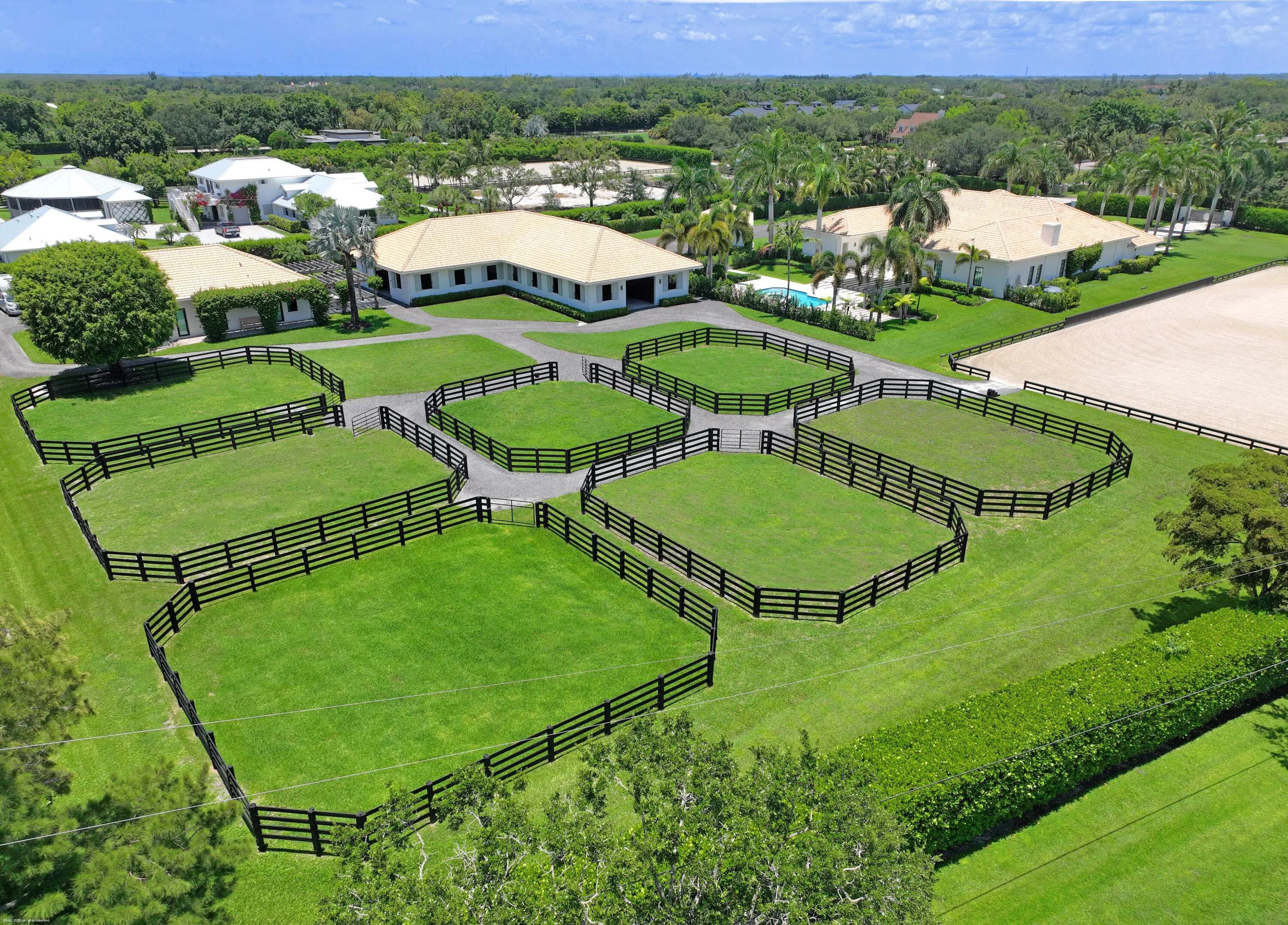 7 paddocks & Stables beyond.