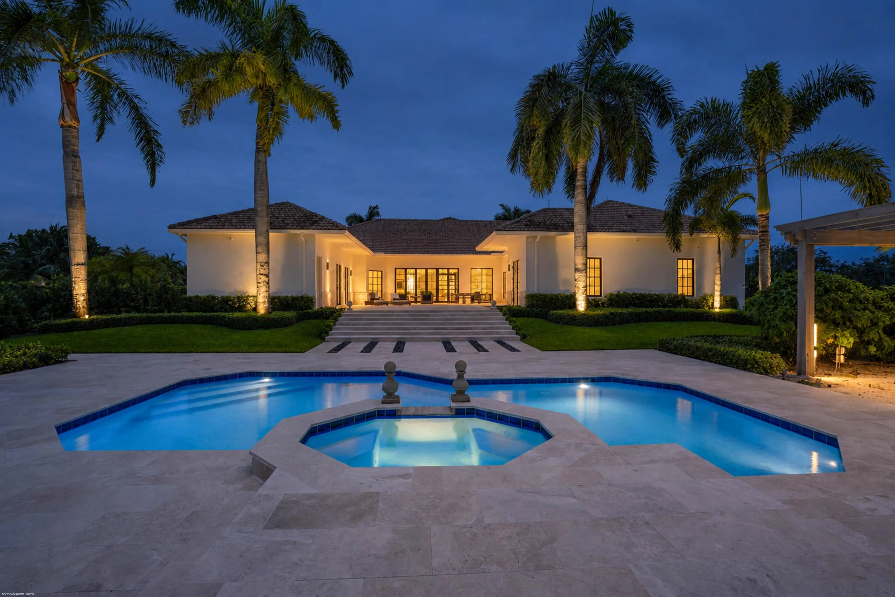 Pool and rear elevation of the main residence