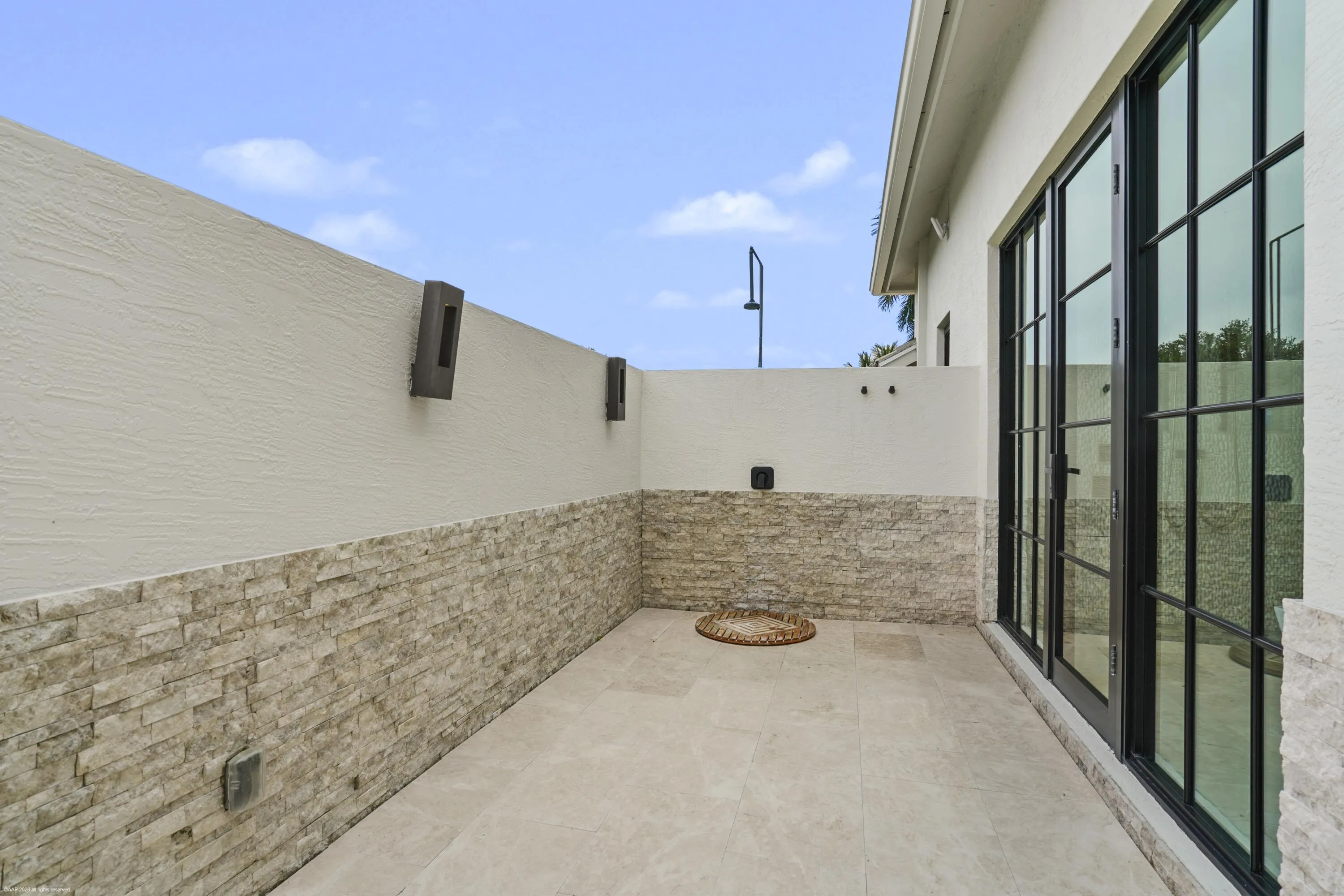 Outdoor showing courtyard or primary bathroom suite