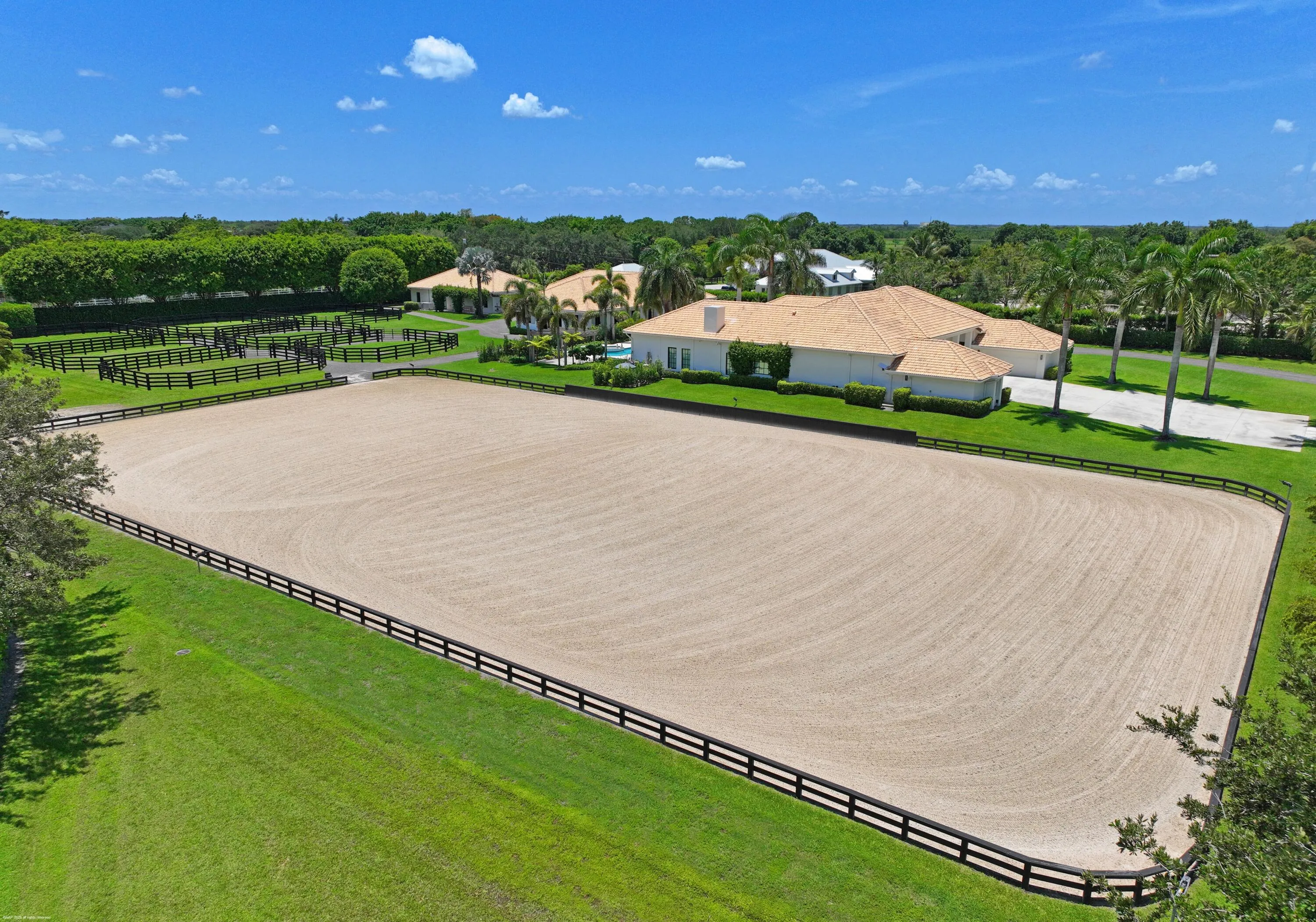Riding arena with new footing and irrigation in December 2025