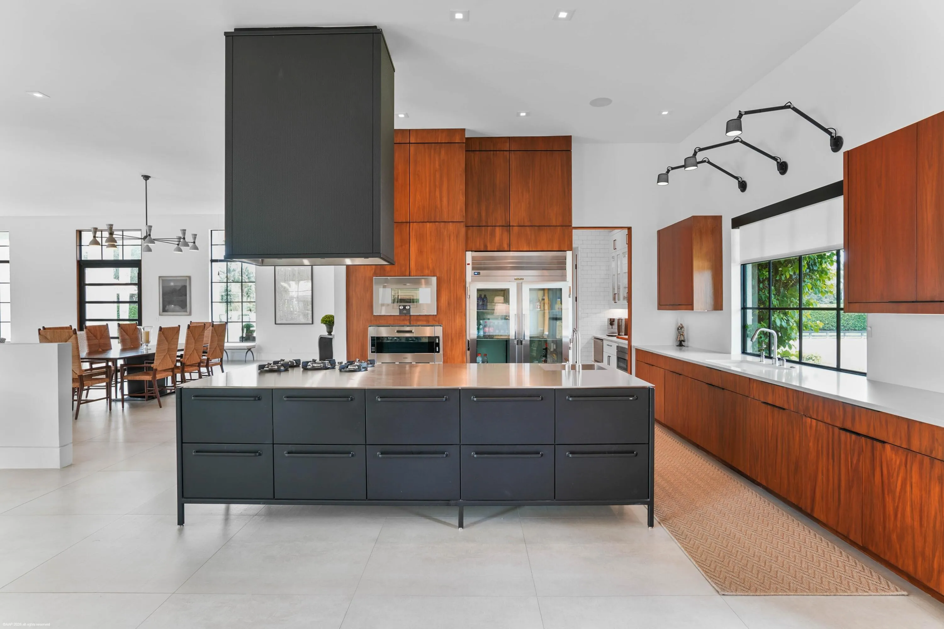 Kitchen with custom cabinetry and stainless steel appliances