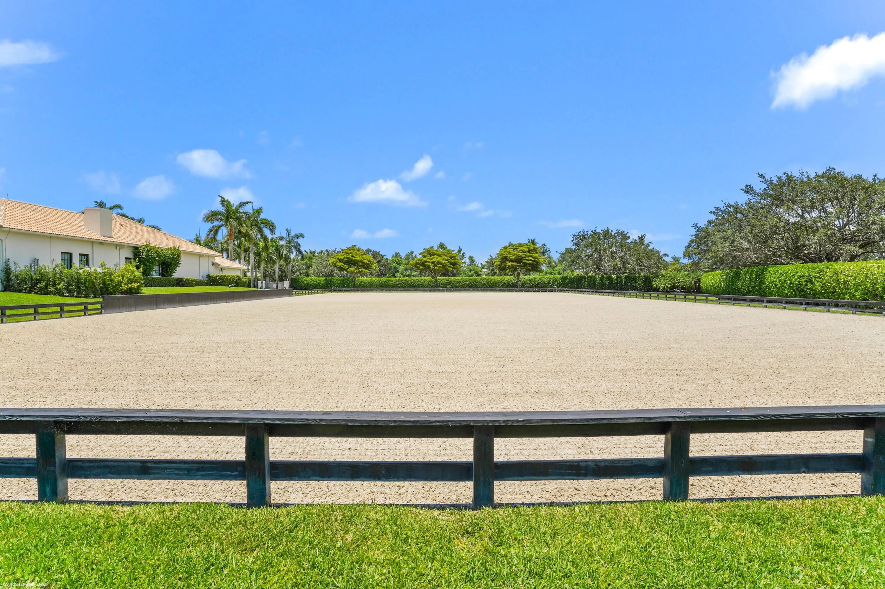 Jumping arena with new footing and irrigation in Dec 2025.