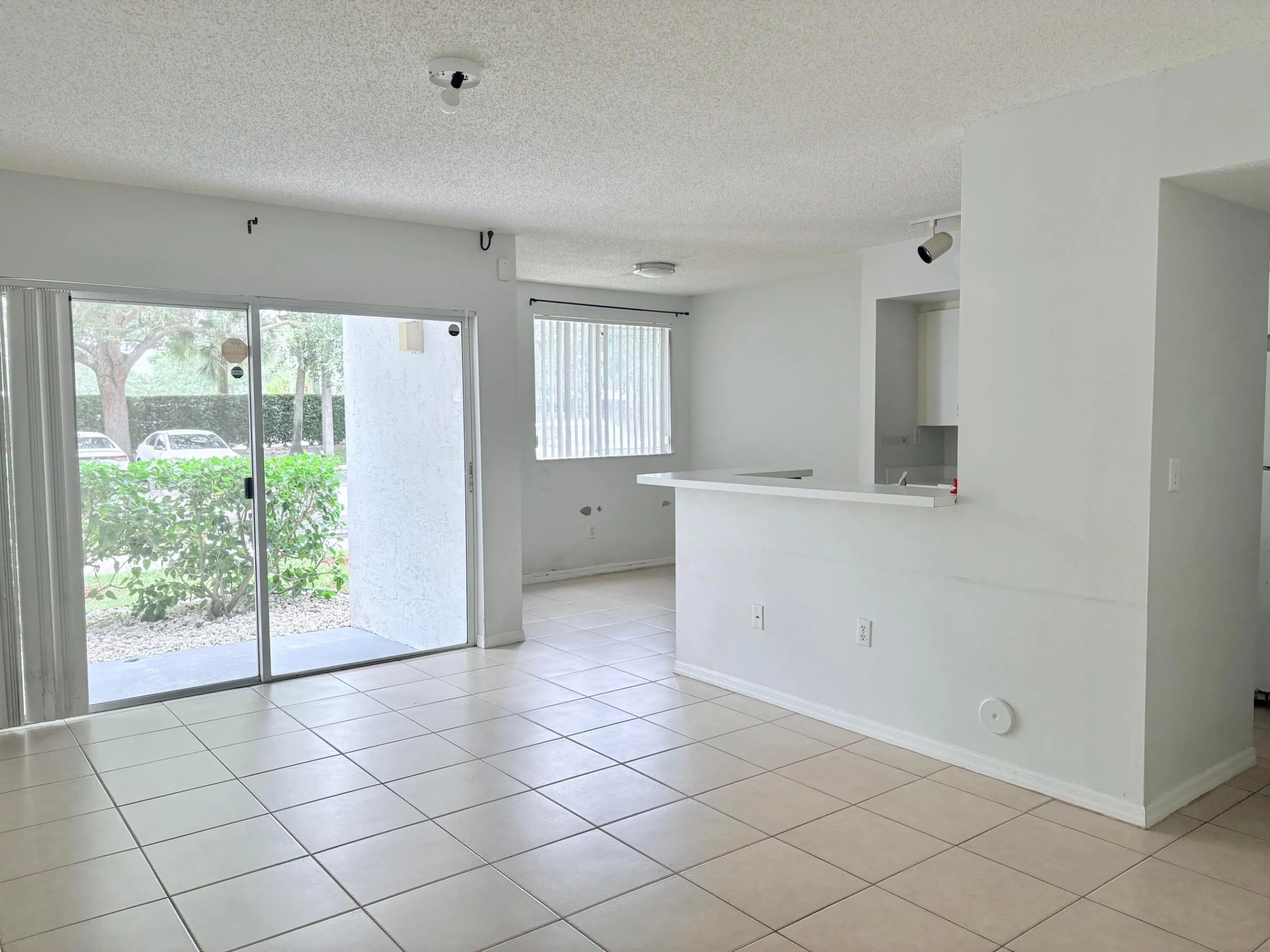 Open kitchen and living plan with a dining area nook.