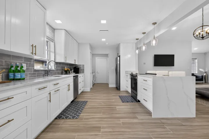 MODERN KITCHEN WITH WATERFALL COUNTER