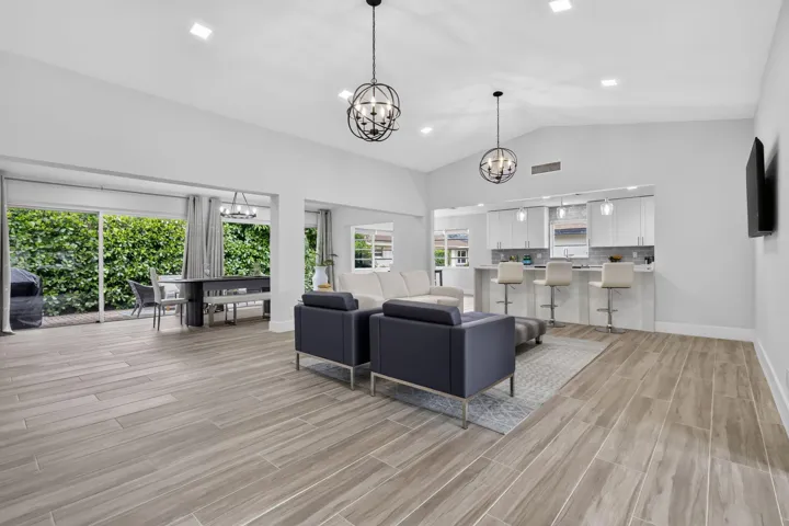 LIVING ROOM WITH CATHEDRAL CEILINGS