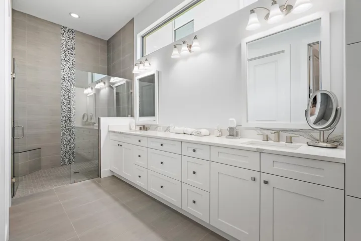 Large Main Bathroom with Extended Vanity & Dual Sinks, Step in Shower, Floor to Ceiling Tile