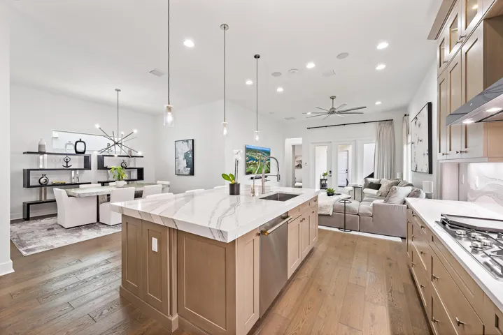 The Open Concept Kitchen Overlooks The Dining Area & Family Room