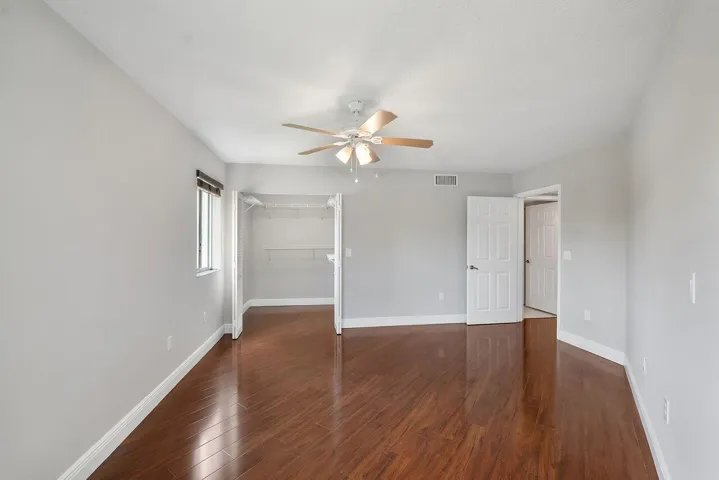 2nd Bedroom with walk in closet with views of the lake
