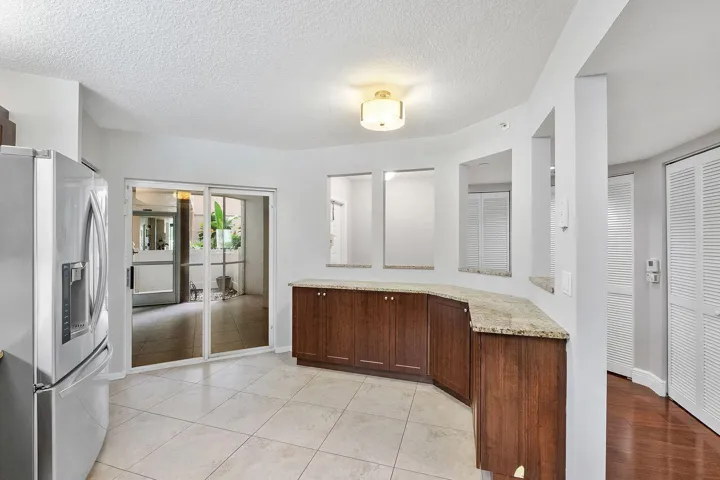 Large Kitchen with sliding door to front patio