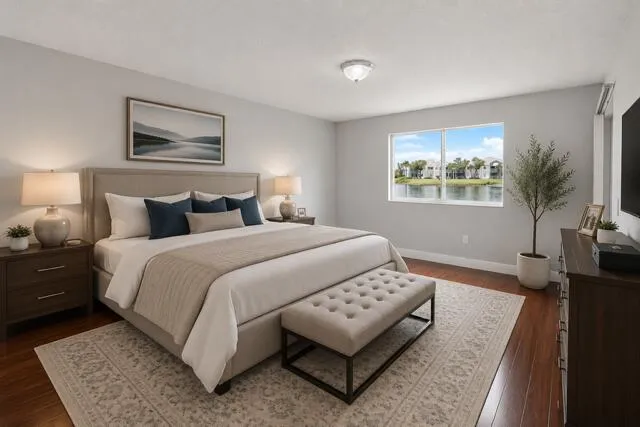 Virtually Staged Primary Bedroom with views of lake