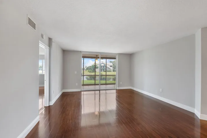 Living Room off Dinning Room and overlooking lake views