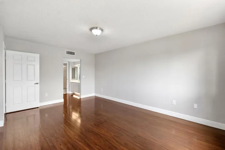 Primary Bedroom with walk in closet and bathroom