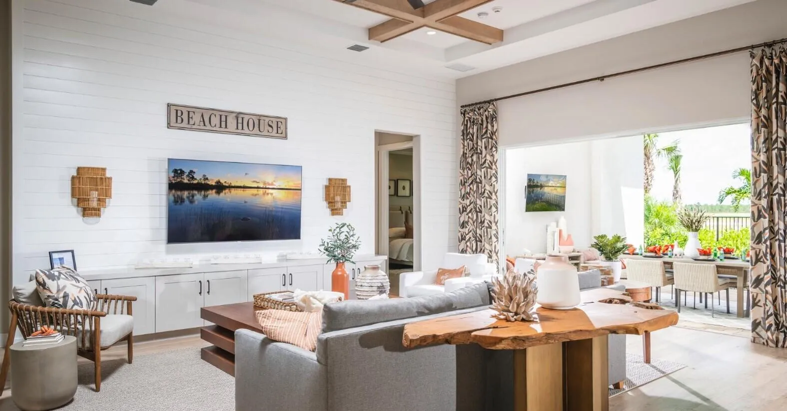 GREAT ROOM WITH SLIDING DOORS PROVIDE ABUNDANT LIGHT