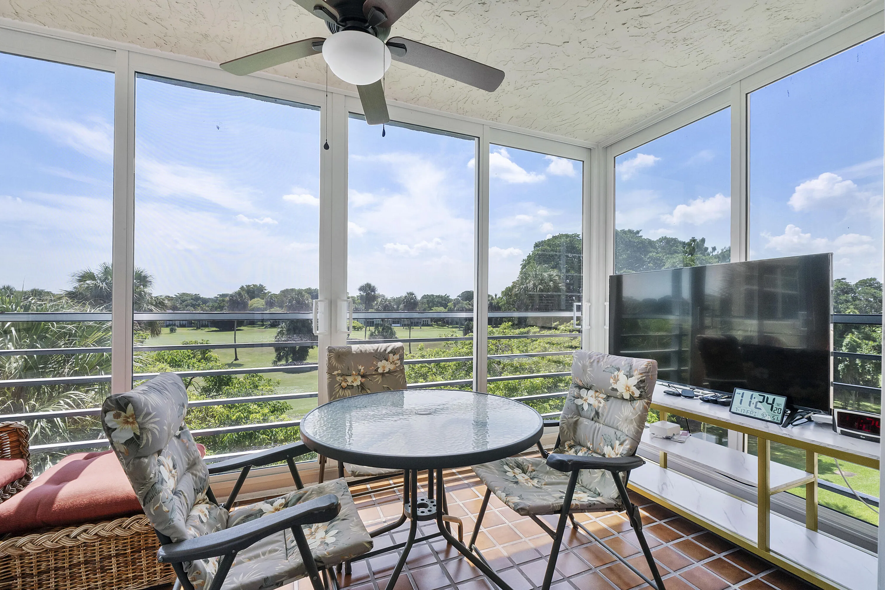 Screened in porch over looking the golf course.