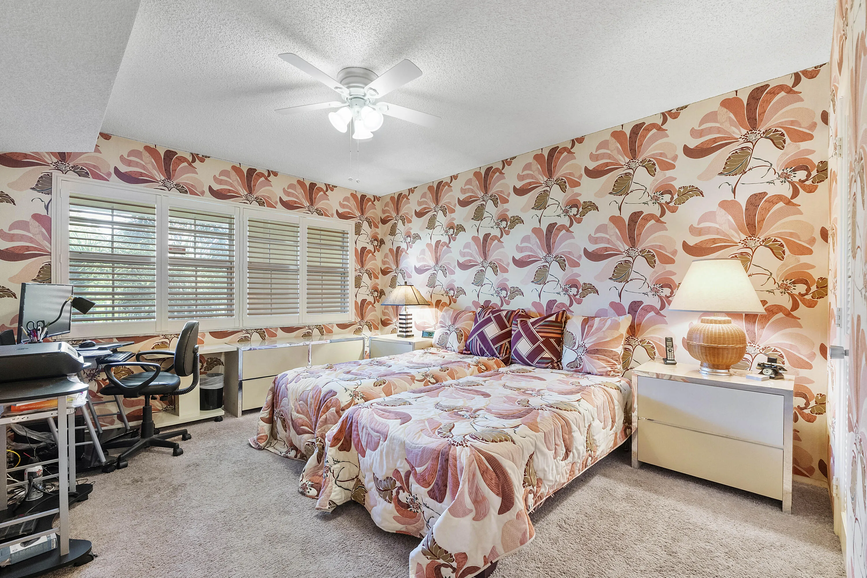 2nd large bedroom. Unique fabric wallpaper.