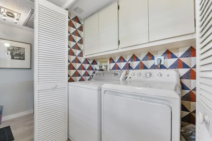 Separate room for laundry in the unit.