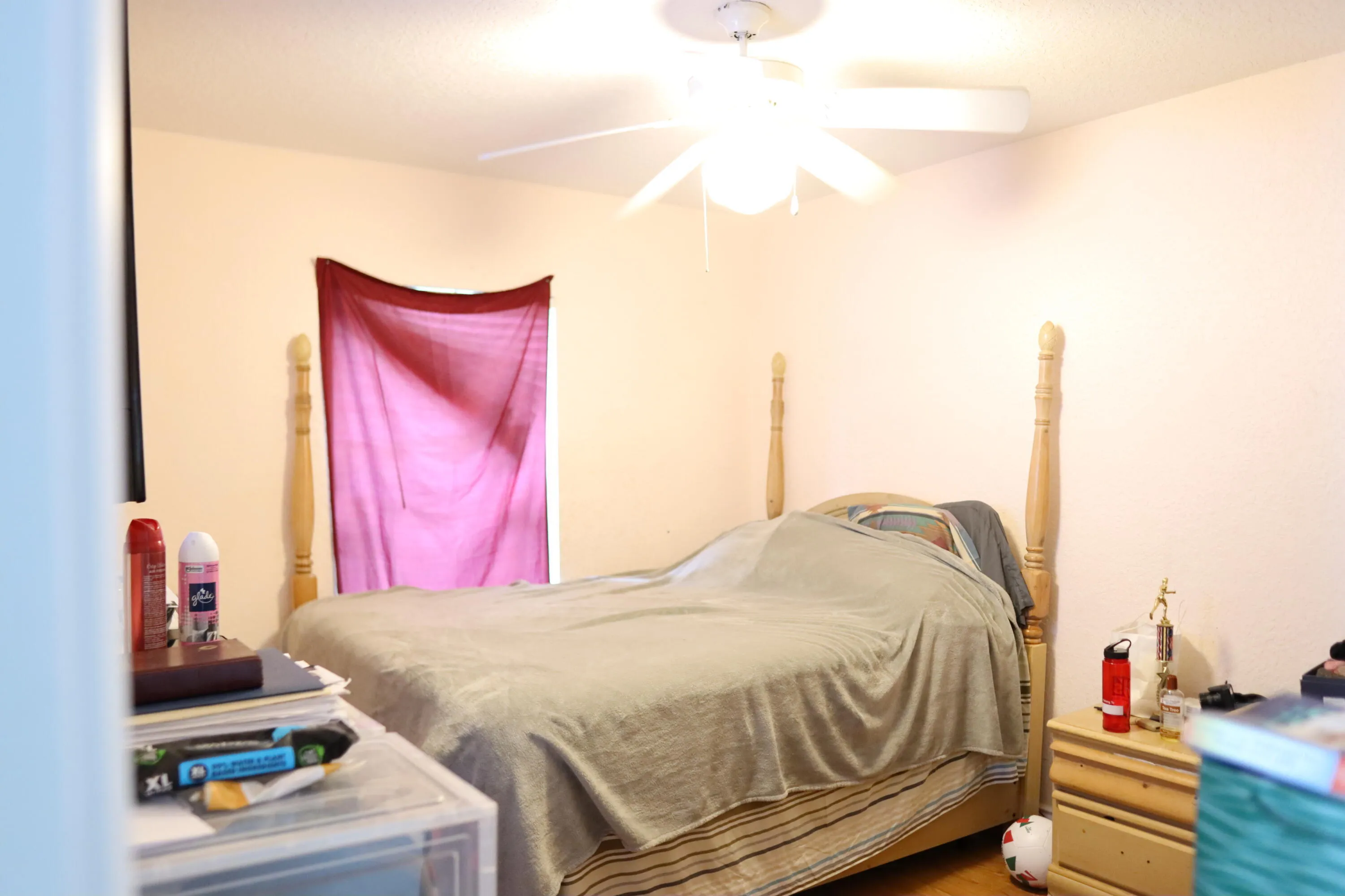 Room featuring light-colored walls and laminate flooring.