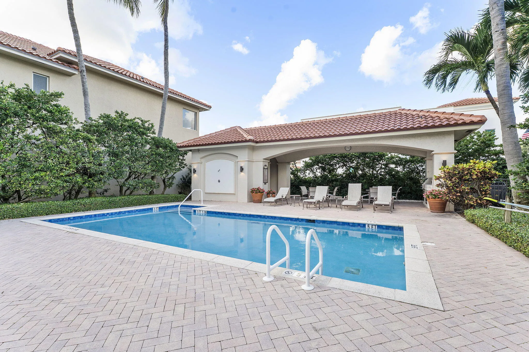 Heated/chilled pool with summer kitchen, outdoor shower and restrooms. Directly across the street from the beach.
